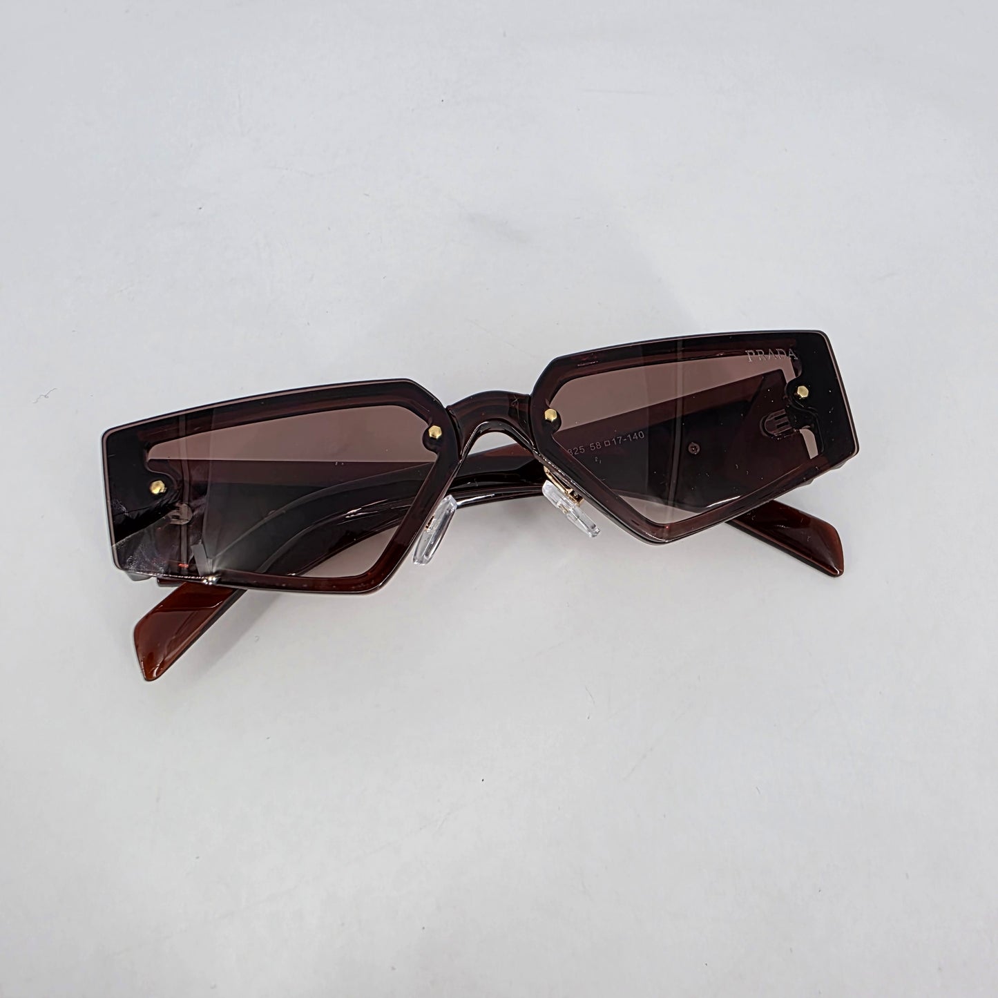 Prada PR58ZS Sunglasses – Brown