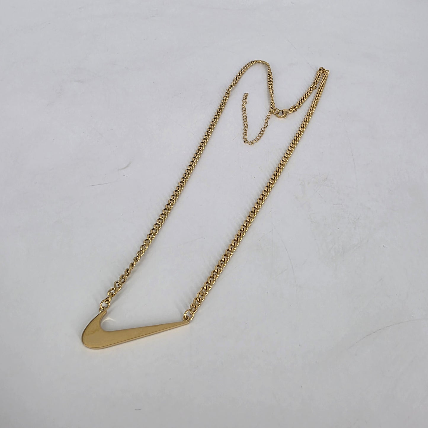 Romela nnaGold Swoosh Signature Necklace: Standalone Swoosh