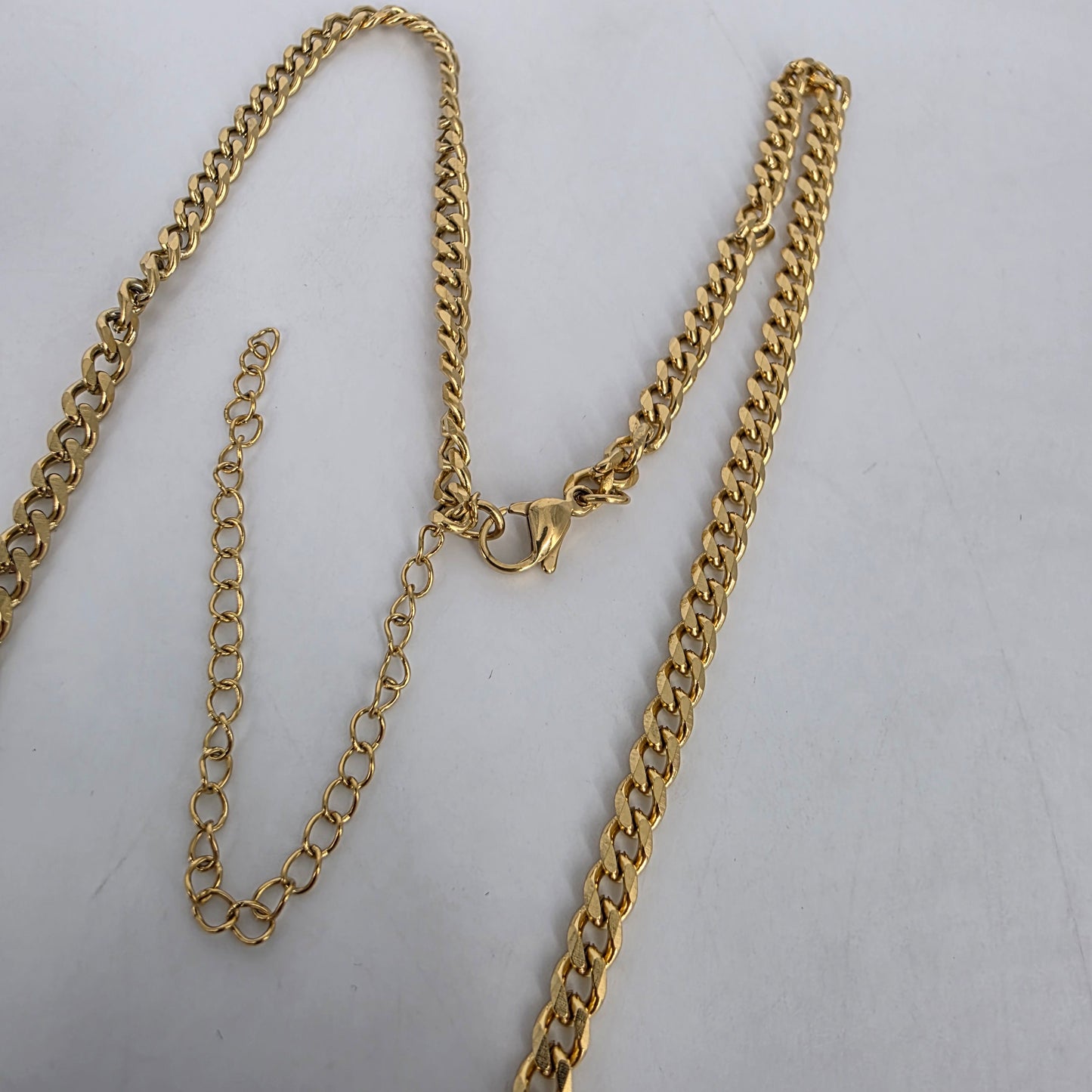 Romela nnaGold Swoosh Signature Necklace: Standalone Swoosh