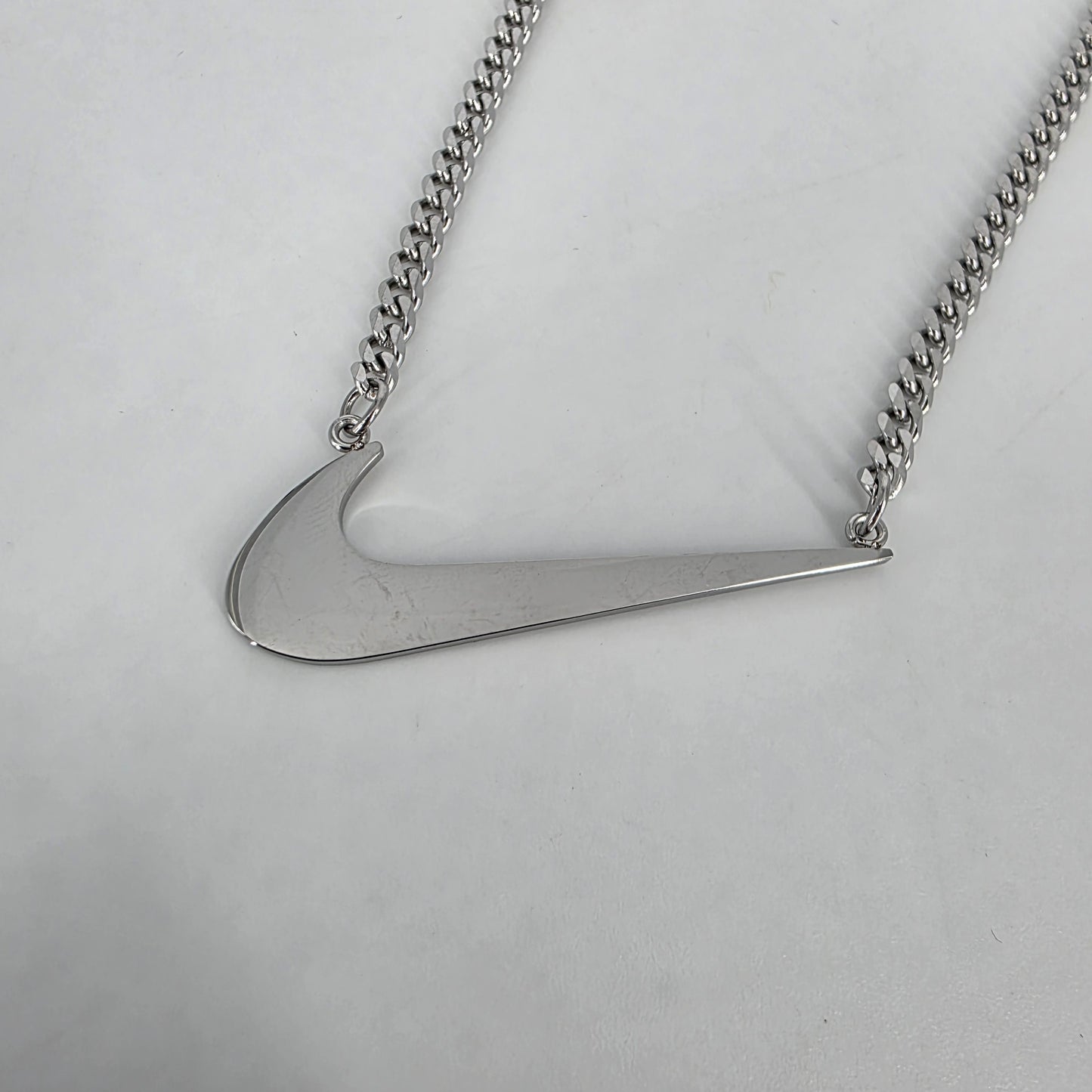 Romela nnaGold Swoosh Signature Necklace: Standalone Swoosh