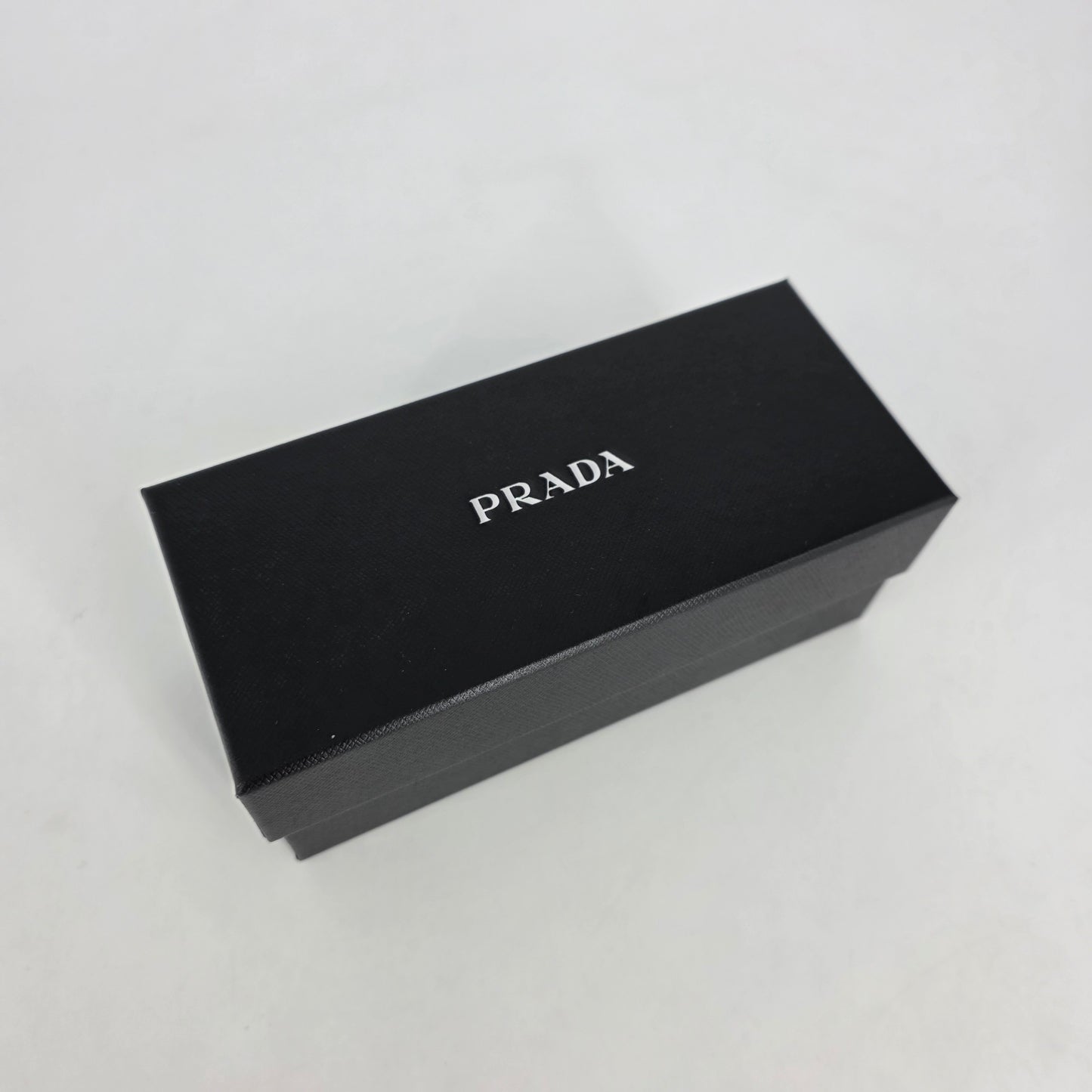 Prada PR58ZS Sunglasses – Brown