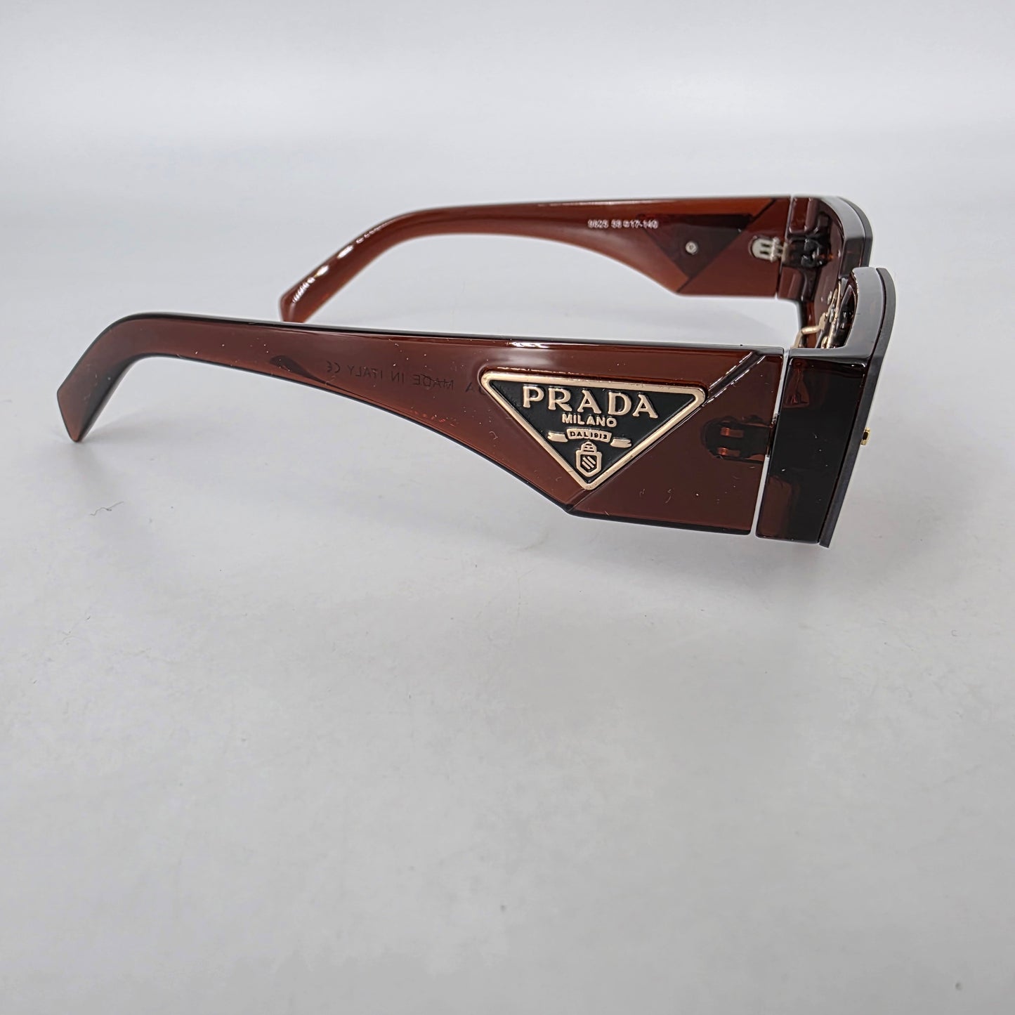 Prada PR58ZS Sunglasses – Brown