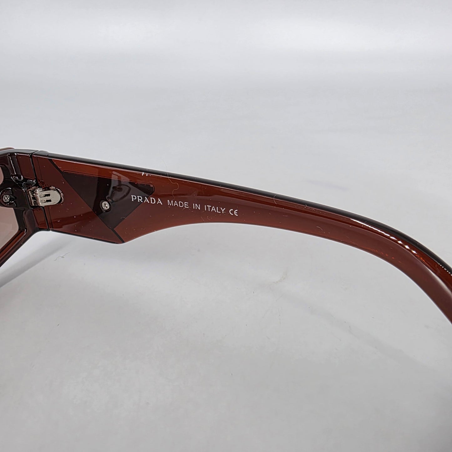 Prada PR58ZS Sunglasses – Brown