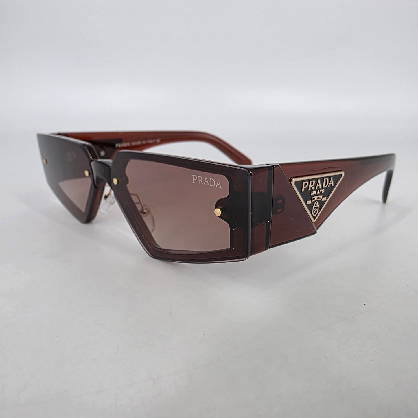 Prada PR58ZS Sunglasses – Brown
